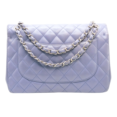 61 - A Chanel Classic Jumbo Quilted Double Flap Bag. Muted lilac diamond-quilted lambskin leather exterio... 