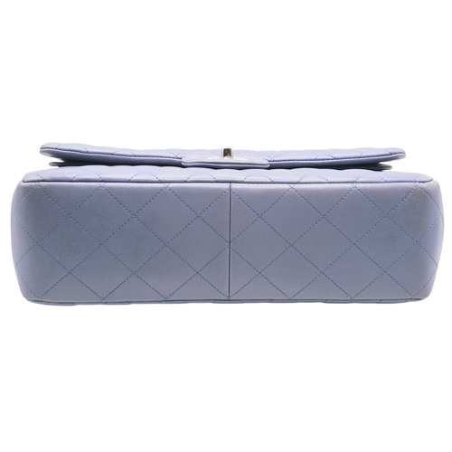 61 - A Chanel Classic Jumbo Quilted Double Flap Bag. Muted lilac diamond-quilted lambskin leather exterio... 