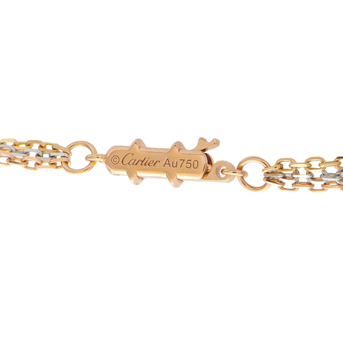 59 - A Cartier Trinity 18K Rose, Yellow, and White Gold 2.60ct Diamond Necklace. The circular pendant ble... 