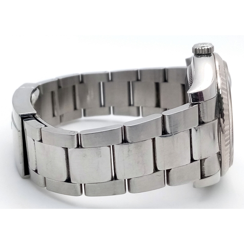 47 - A Rolex Datejust Automatic Gents Watch. Model 116234. Stainless steel bracelet and case - 36mm. Ice ... 