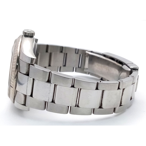47 - A Rolex Datejust Automatic Gents Watch. Model 116234. Stainless steel bracelet and case - 36mm. Ice ... 