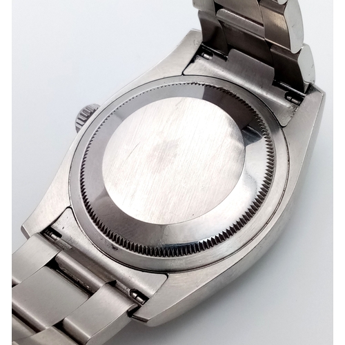 47 - A Rolex Datejust Automatic Gents Watch. Model 116234. Stainless steel bracelet and case - 36mm. Ice ... 