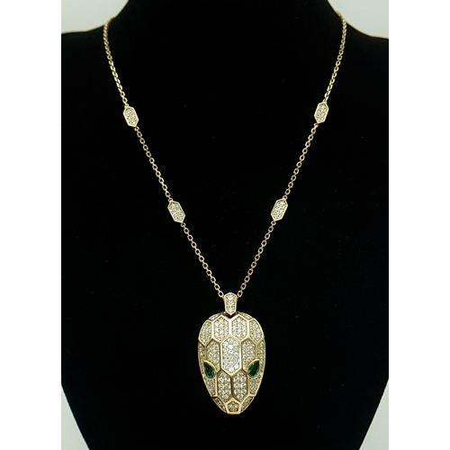 58 - A W.G.I Certified Stunning 18K Yellow Gold, Diamond and Emerald Panther Head Pendant - Presented on ... 