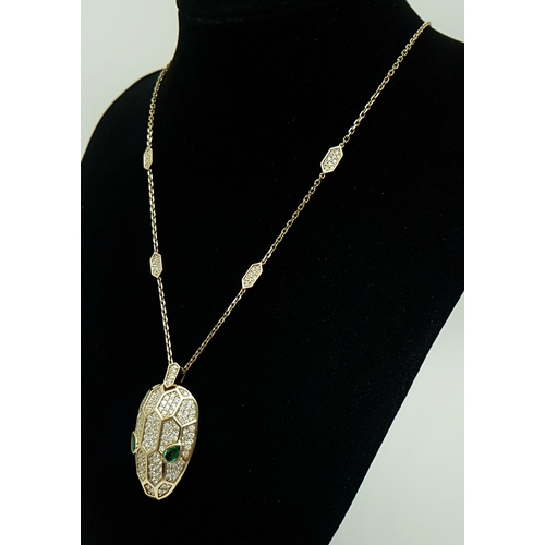 58 - A W.G.I Certified Stunning 18K Yellow Gold, Diamond and Emerald Panther Head Pendant - Presented on ... 