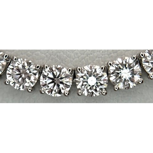26 - A W.G.I Certified 10K White Gold, Diamond Tennis Necklace. Set with 114 round brilliant lab grown di... 