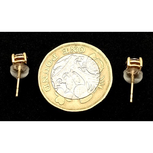 509 - A Pair of 18K Yellow Gold and Diamond Stud Earrings. 0.80ctw of round brilliant cut diamonds having ... 