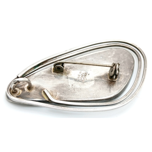 42 - A vintage 925 silver Mosaic style Mother of Pearl inlaid brooch. Total weight 9.5G. Total length 6.5... 