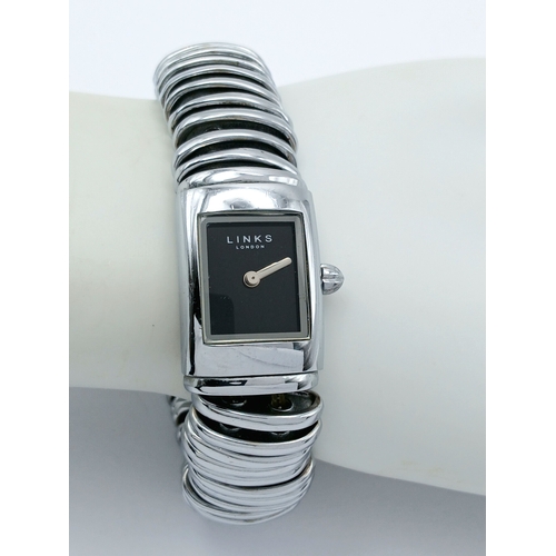33 - A Links, Stainless Steel, Expandable Bracelet Watch. With Black Dial. Comes with an original box. As... 