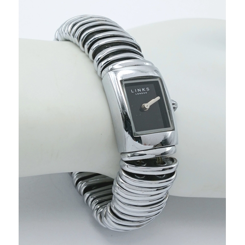 33 - A Links, Stainless Steel, Expandable Bracelet Watch. With Black Dial. Comes with an original box. As... 