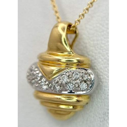 16 - An 18K Yellow and White Gold Diamond Pendant with Figure 8 Safety Catch Clasp. Comes with 18K Yellow... 