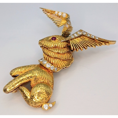 37 - An 18K Yellow Gold (tests as) and Diamond Winged Rabbit with Ruby Eye Brooch. 5cm x 4cm ear-span! 13... 