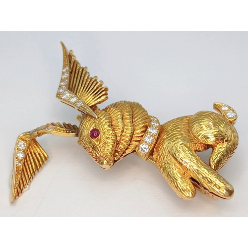 37 - An 18K Yellow Gold (tests as) and Diamond Winged Rabbit with Ruby Eye Brooch. 5cm x 4cm ear-span! 13... 
