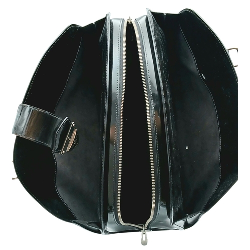 45 - A Sophisticated Louis Vuitton Black Electric Epi Leather Pont-Neuf GM Handbag. Textured patent exter... 