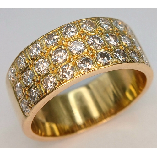 20 - AN 18K YELLOW GOLD, 3 ROW, DIAMOND SET BAND RING. 1.15CTW. 10.2G, SIZE R. SC 7074
