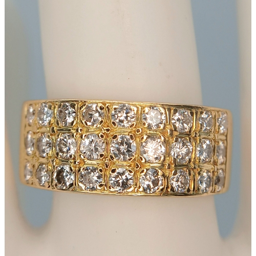 20 - AN 18K YELLOW GOLD, 3 ROW, DIAMOND SET BAND RING. 1.15CTW. 10.2G, SIZE R. SC 7074