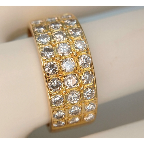 20 - AN 18K YELLOW GOLD, 3 ROW, DIAMOND SET BAND RING. 1.15CTW. 10.2G, SIZE R. SC 7074