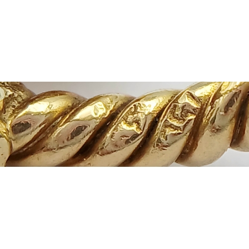 13 - AN 18K YELLOW GOLD, DOUBLE LIONS HEAD, TWISTED ROPE DESIGN RING. 9.1G, SIZE K/L. SC 7083