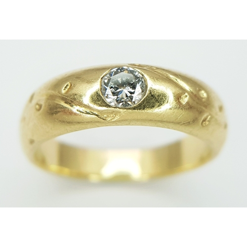 43 - An 18K Yellow Gold (tests as) Diamond Set Band Ring. 0.15ct deep-set round cut diamond. 5.5g total w... 