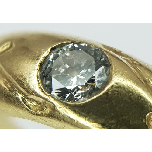 43 - An 18K Yellow Gold (tests as) Diamond Set Band Ring. 0.15ct deep-set round cut diamond. 5.5g total w... 
