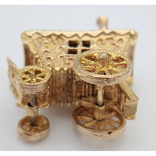 24 - A 9K Yellow Gold, Fancy Carriage Pendant/Charm - with Turning Wheels! 2.5cm. 8.35g.