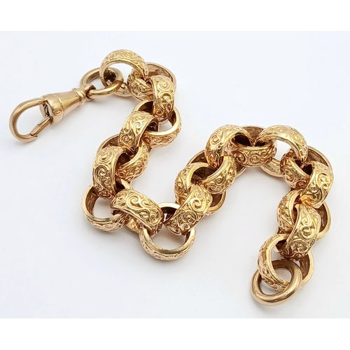 51 - A Chunky 9K Gold Statement Bracelet with Circular, Intricate Pattern Engraved Links. Large lobster c... 