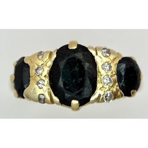 8 - A Vintage 18K Yellow Gold, Sapphire and Diamond Ring. Circa 2.5ctw of oval cut sapphires with round ... 