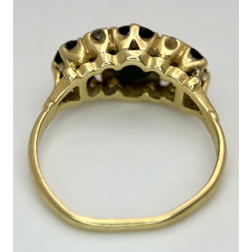 8 - A Vintage 18K Yellow Gold, Sapphire and Diamond Ring. Circa 2.5ctw of oval cut sapphires with round ... 