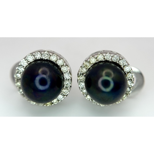 47 - A Pair of 14K White Gold Tahitian Pearl and Diamond Stud Earrings. Beautiful 8mm pearls with diamond... 