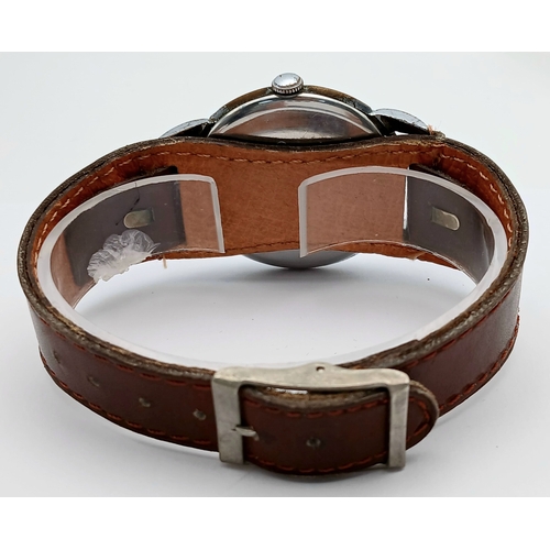 35 - Gentleman’s Vintage ‘PRECIA’ WRISTWATCH. Having subsidiary seconds dial  at 6 o’clock. 37mm case. Br... 