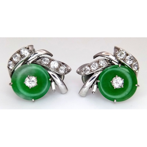 197 - A Stunning Pair of Jade and Diamond Earrings - Each having a circular jade piece with a 0.20ct round... 