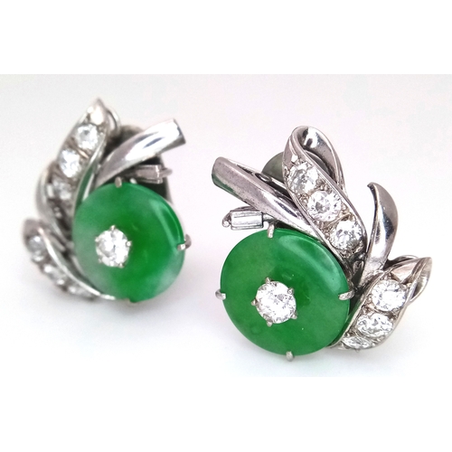 197 - A Stunning Pair of Jade and Diamond Earrings - Each having a circular jade piece with a 0.20ct round... 