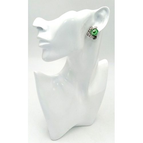 197 - A Stunning Pair of Jade and Diamond Earrings - Each having a circular jade piece with a 0.20ct round... 