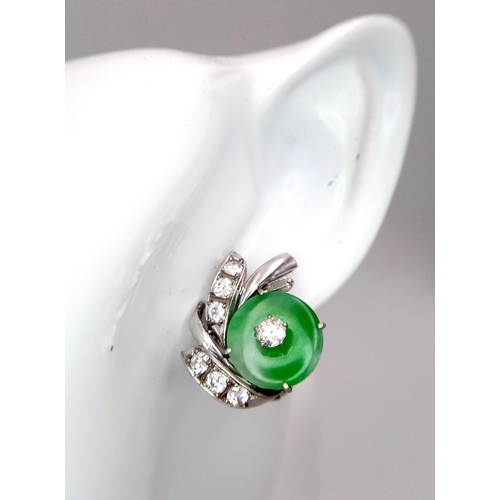 197 - A Stunning Pair of Jade and Diamond Earrings - Each having a circular jade piece with a 0.20ct round... 