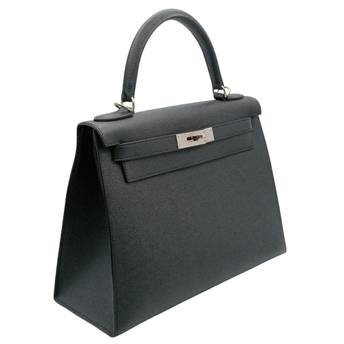 79 - A Highly Collectable Hermes Black Kelly 28 Bag. Epsom leather exterior with silver-toned hardware to... 