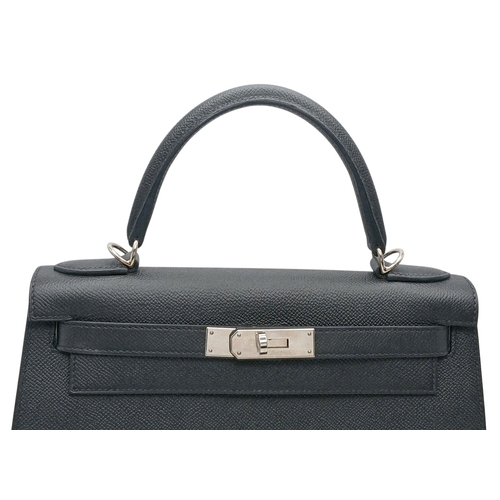 79 - A Highly Collectable Hermes Black Kelly 28 Bag. Epsom leather exterior with silver-toned hardware to... 