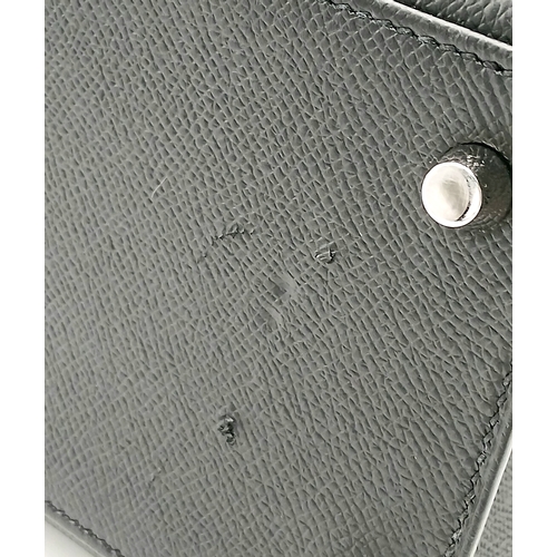 79 - A Highly Collectable Hermes Black Kelly 28 Bag. Epsom leather exterior with silver-toned hardware to... 