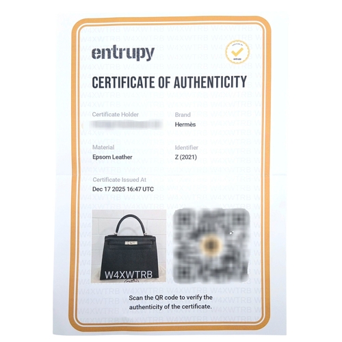 79 - A Highly Collectable Hermes Black Kelly 28 Bag. Epsom leather exterior with silver-toned hardware to... 