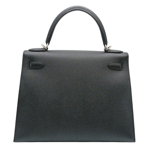 79 - A Highly Collectable Hermes Black Kelly 28 Bag. Epsom leather exterior with silver-toned hardware to... 