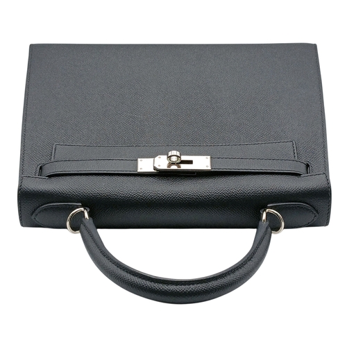 79 - A Highly Collectable Hermes Black Kelly 28 Bag. Epsom leather exterior with silver-toned hardware to... 