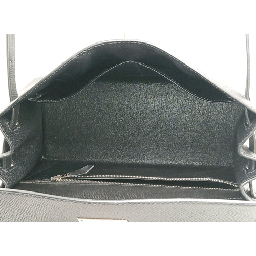 79 - A Highly Collectable Hermes Black Kelly 28 Bag. Epsom leather exterior with silver-toned hardware to... 
