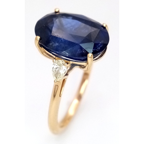144 - An IGI Certified 18K Yellow Gold (tests as) Sapphire and Diamond Cocktail Ring. An 8.05ct natural ov... 