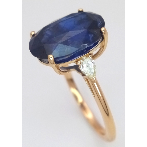 144 - An IGI Certified 18K Yellow Gold (tests as) Sapphire and Diamond Cocktail Ring. An 8.05ct natural ov... 