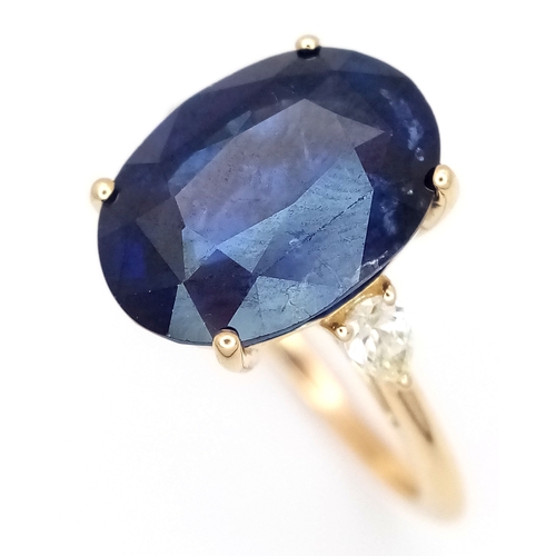 144 - An IGI Certified 18K Yellow Gold (tests as) Sapphire and Diamond Cocktail Ring. An 8.05ct natural ov... 