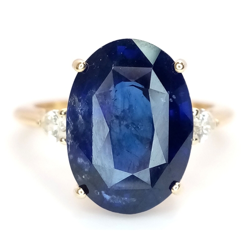 144 - An IGI Certified 18K Yellow Gold (tests as) Sapphire and Diamond Cocktail Ring. An 8.05ct natural ov... 