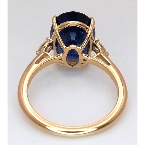 144 - An IGI Certified 18K Yellow Gold (tests as) Sapphire and Diamond Cocktail Ring. An 8.05ct natural ov... 
