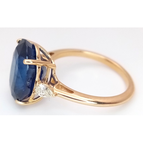 144 - An IGI Certified 18K Yellow Gold (tests as) Sapphire and Diamond Cocktail Ring. An 8.05ct natural ov... 