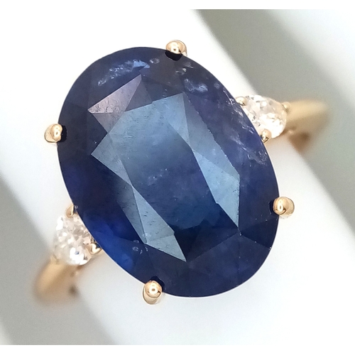 144 - An IGI Certified 18K Yellow Gold (tests as) Sapphire and Diamond Cocktail Ring. An 8.05ct natural ov... 