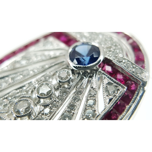 122 - A Head-Turning 18K White Gold Mult-Gemstone Cocktail Ring in Oval Shield Form. A 0.47ct sapphire sit... 