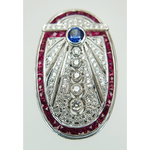 122 - A Head-Turning 18K White Gold Mult-Gemstone Cocktail Ring in Oval Shield Form. A 0.47ct sapphire sit... 