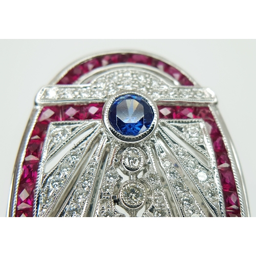 122 - A Head-Turning 18K White Gold Mult-Gemstone Cocktail Ring in Oval Shield Form. A 0.47ct sapphire sit... 